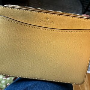 Light yellow Kate Spade crossbody purse